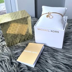 NWT authentic MK gold tone charm bracelet